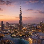 Burj Khalifa rising above Downtown Dubai at dusk