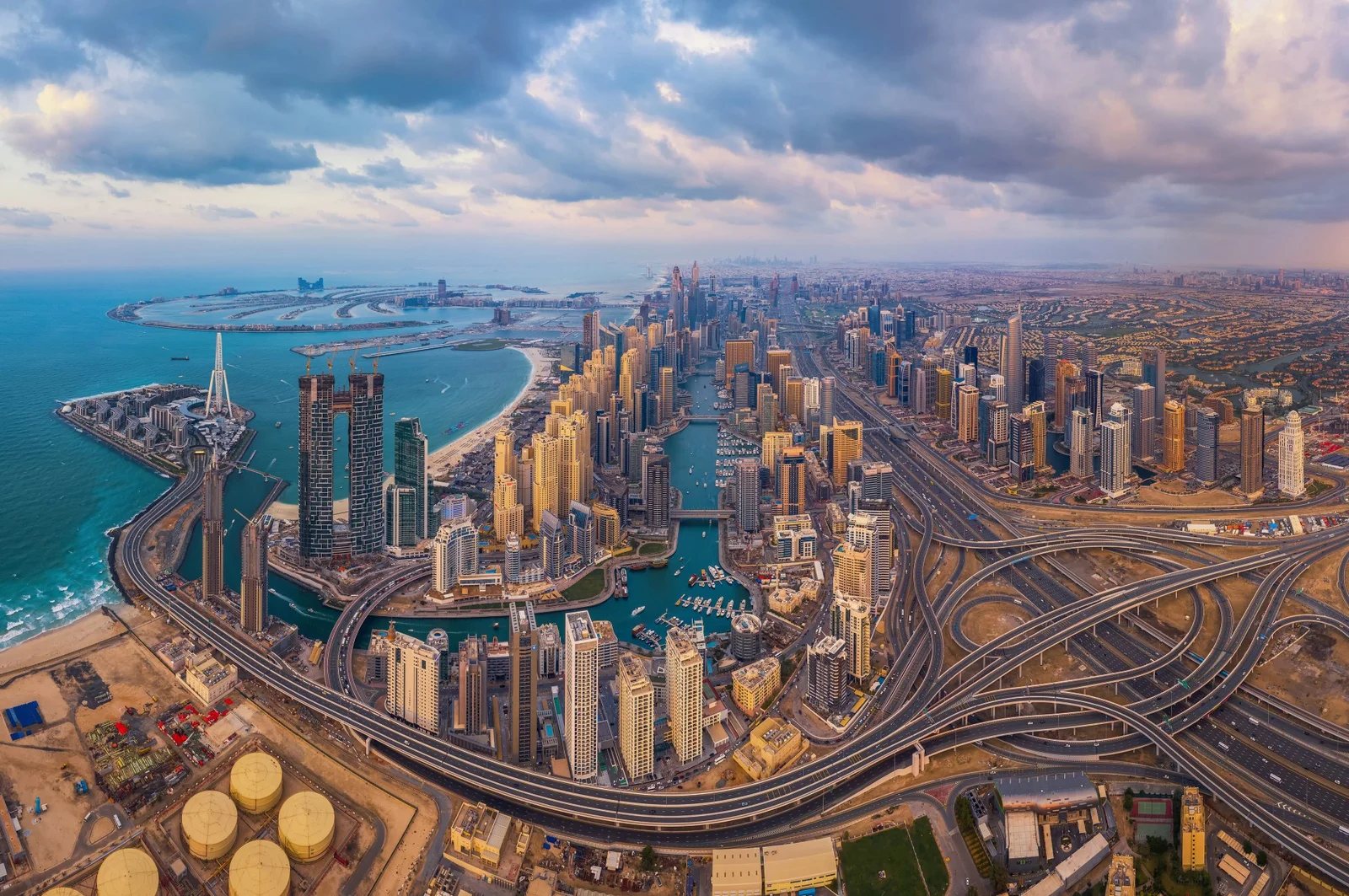Aerial view of Dubai Marina with Palm Jumeirah in the distance