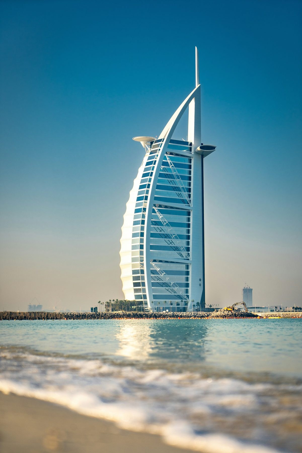 Burj Al Arab Jumeirah sail-shaped tower rising above the sea in Dubai