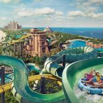 Aerial view of Aquaventure waterpark at Atlantis The Palm Dubai with waterslides, beach, and the resort towers