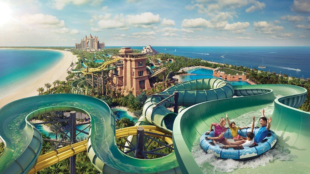 Aerial view of Aquaventure waterpark at Atlantis The Palm Dubai with waterslides, beach, and the resort towers