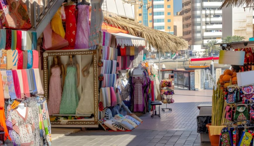 Busy Karama market street in Dubai with shops and shoppers