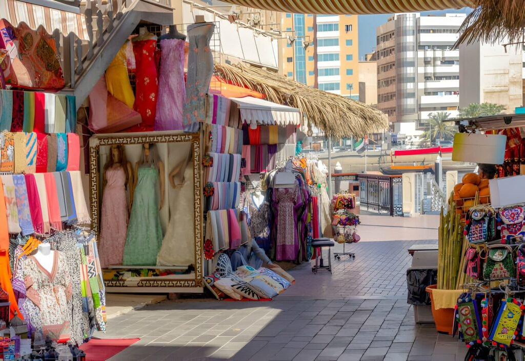Busy Karama market street in Dubai with shops and shoppers