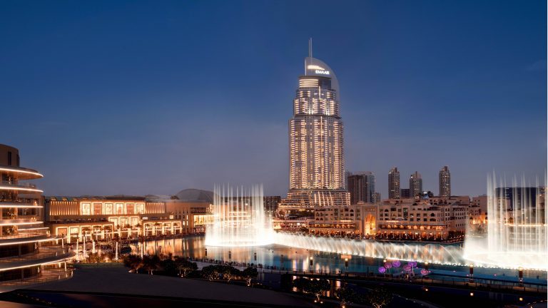 Address Downtown hotel tower at night overlooking the Dubai Fountain