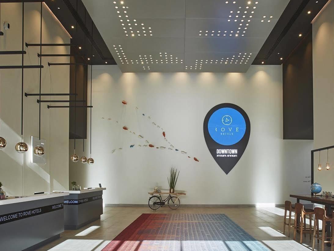 Bright design-led lobby of Rove Downtown hotel in Dubai