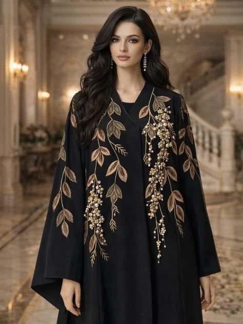 Black kimono-style abaya with gold embroidery and wide flowing sleeves