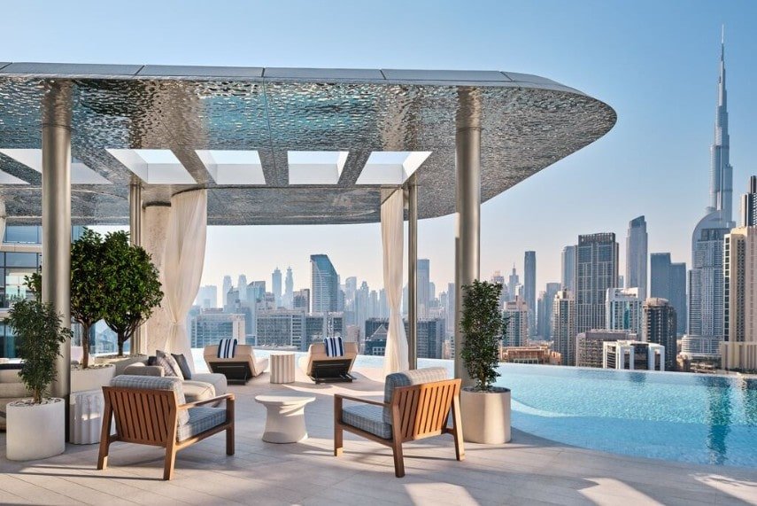 Infinity pool at a Dubai resort with skyline views