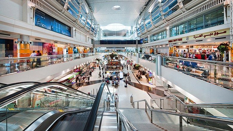 Dubai International Airport terminal building with aircraft at the gates