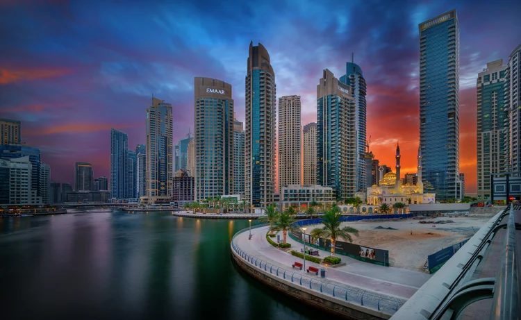Dubai Marina skyline reflected in the marina water at dusk