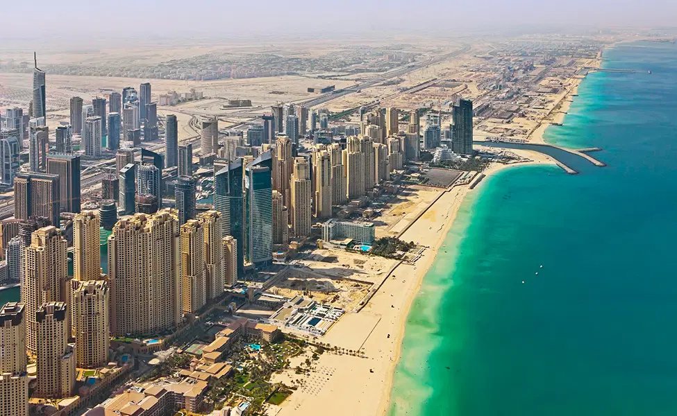 Aerial view of JBR beach with turquoise water and the Marina towers