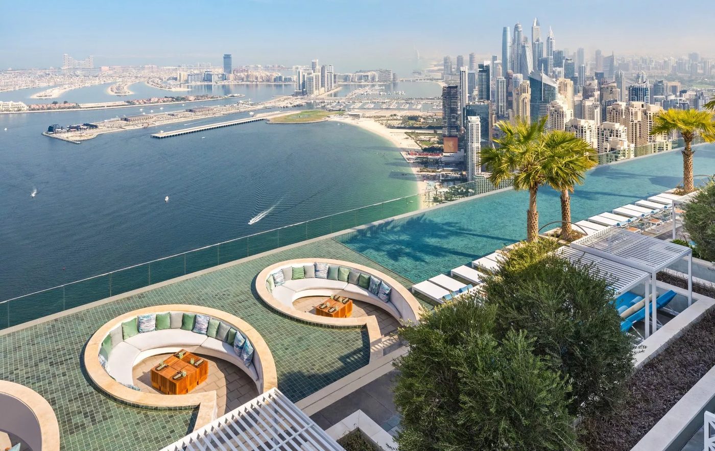 Infinity pool at a luxury Dubai hotel overlooking the sea