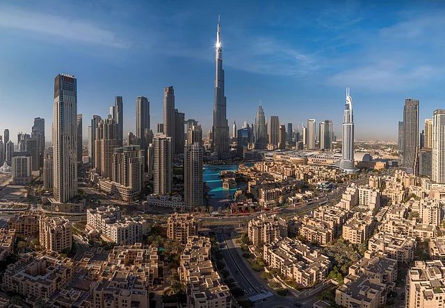 Dubai skyline with modern skyscrapers under a clear blue sky