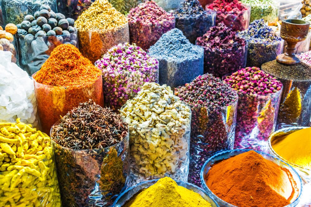 Spice stalls at a Dubai souk, source of cheap snacks and souvenirs