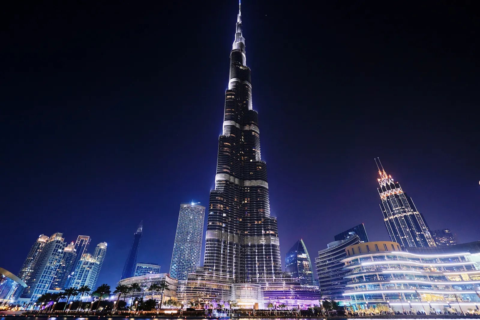 Burj Khalifa illuminated at night over Downtown Dubai