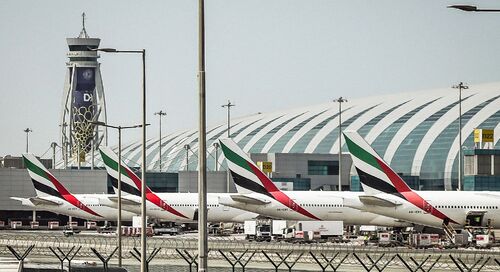 Aircraft tails at Dubai International Airport terminal gates