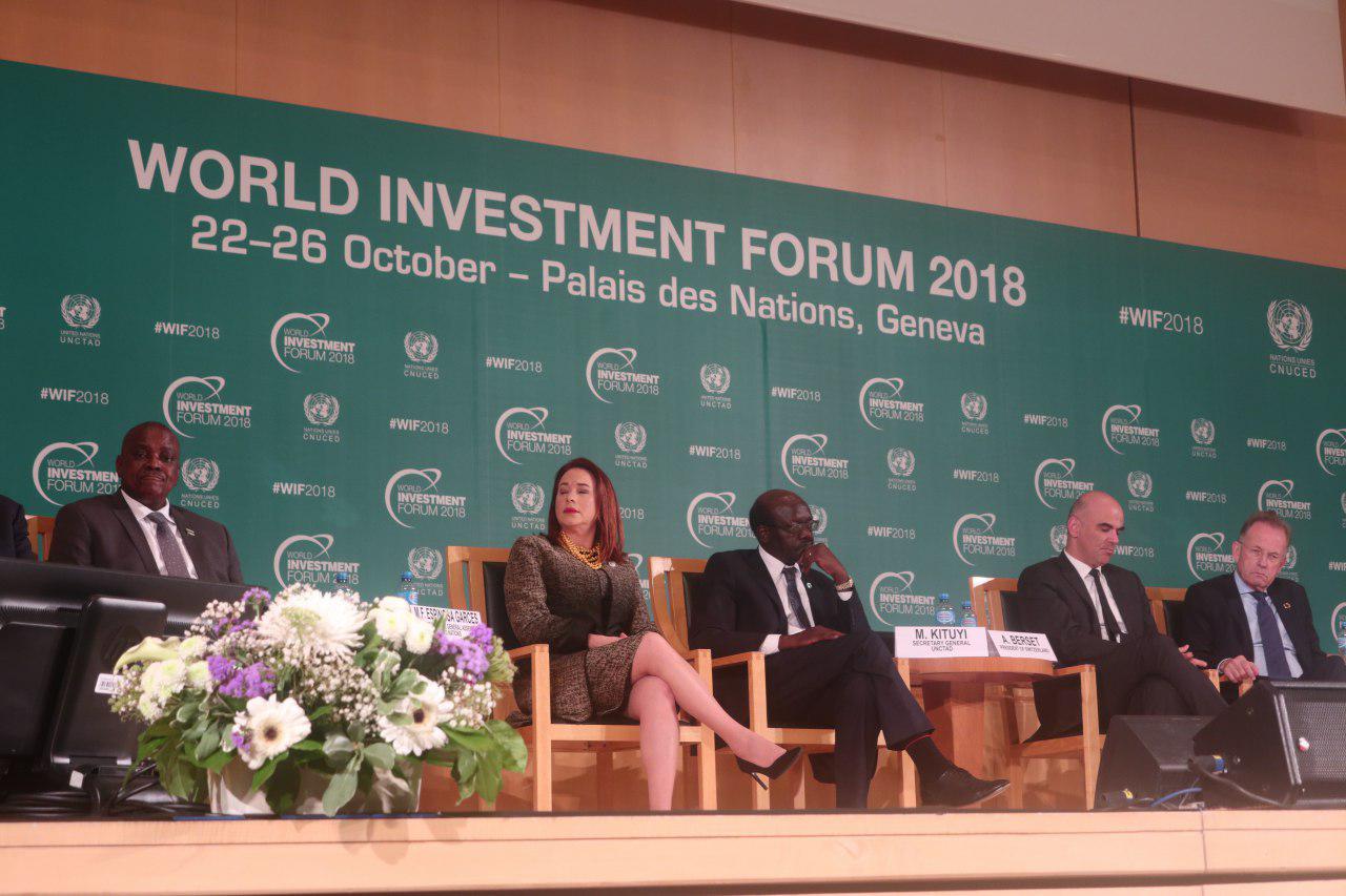 Panel of ministers and investors on a conference stage