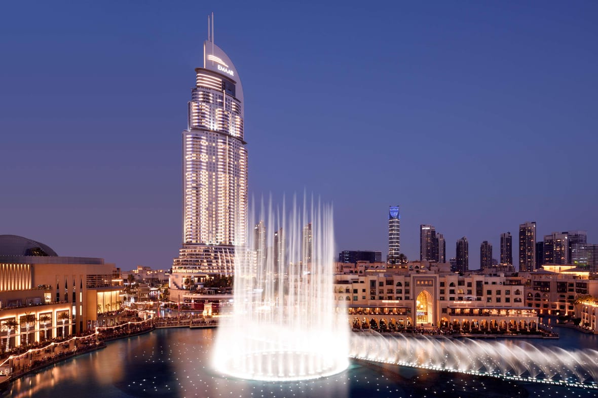 Address Downtown hotel tower facing Dubai Fountain and Burj Khalifa