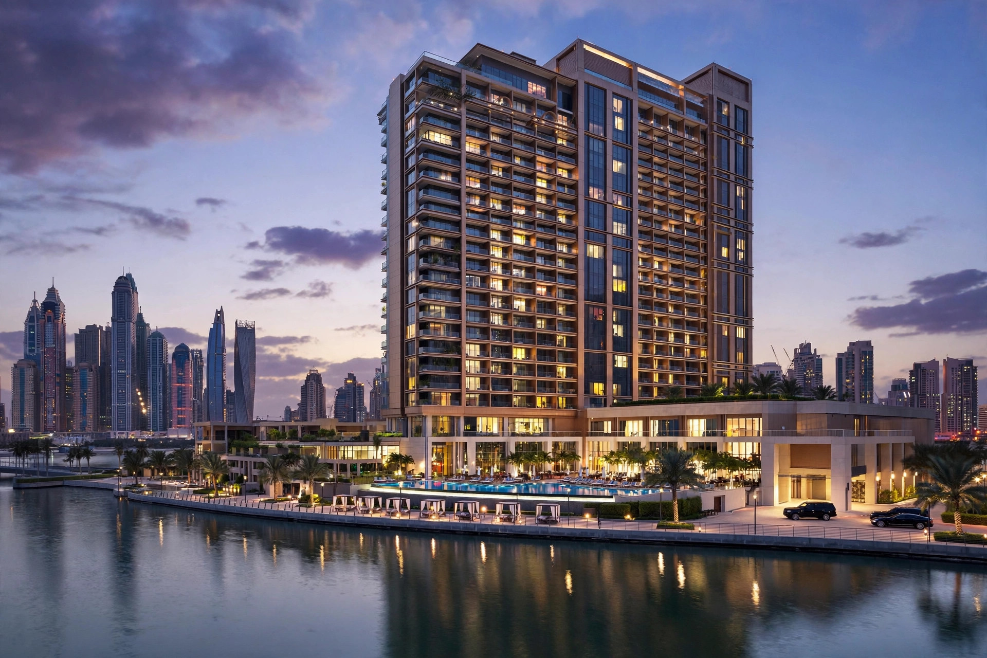 voco Bonnington Dubai tower above the JLT lake in Cluster J at dusk