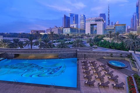 Crowne Plaza Dubai Festival City pool deck with views across the Creek