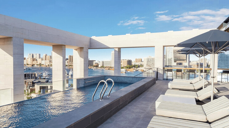 Canopy by Hilton Dubai Al Seef rooftop pool and Creek view