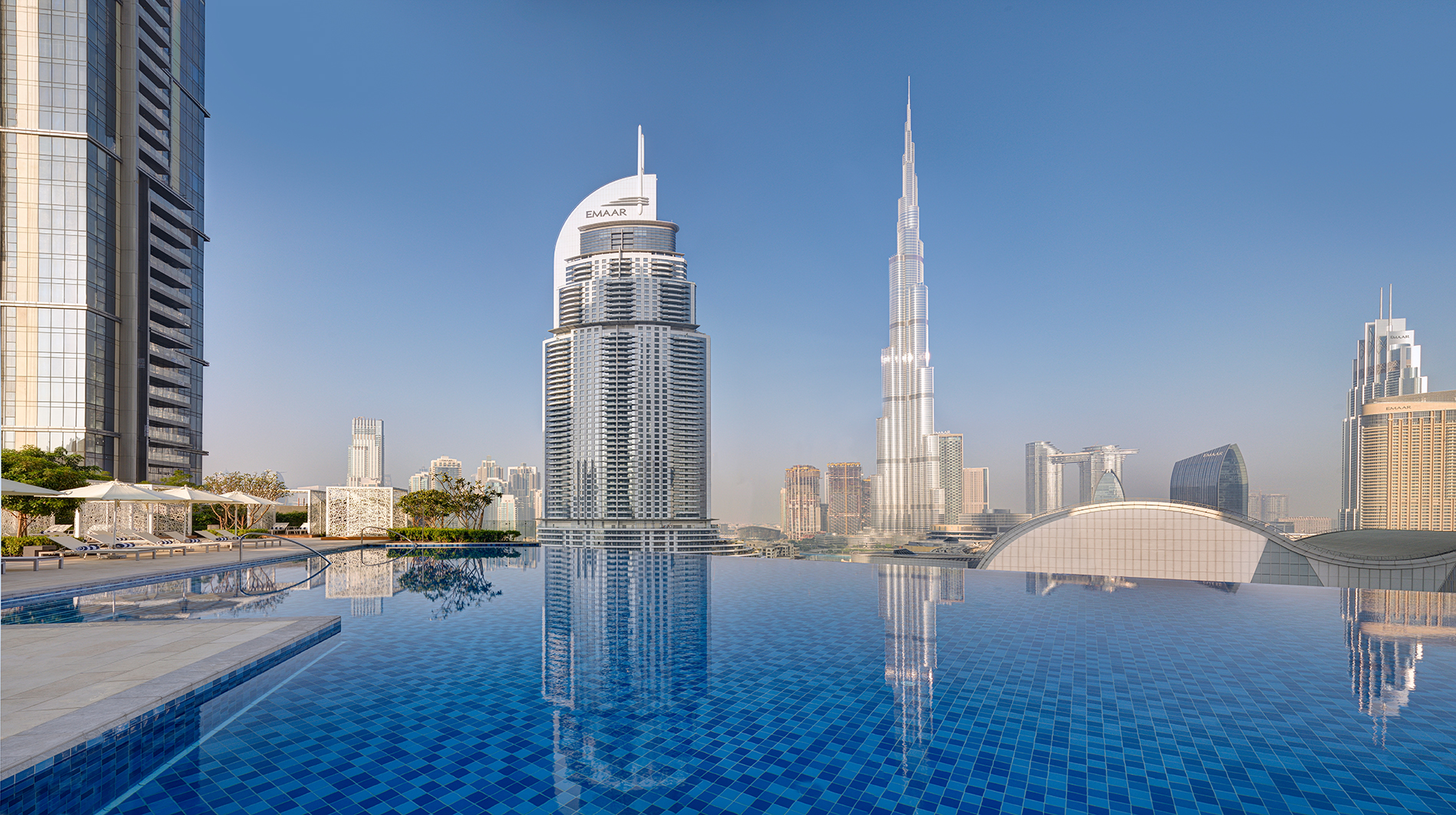 Pool deck in Downtown Dubai facing the Dubai Fountain and Burj Khalifa