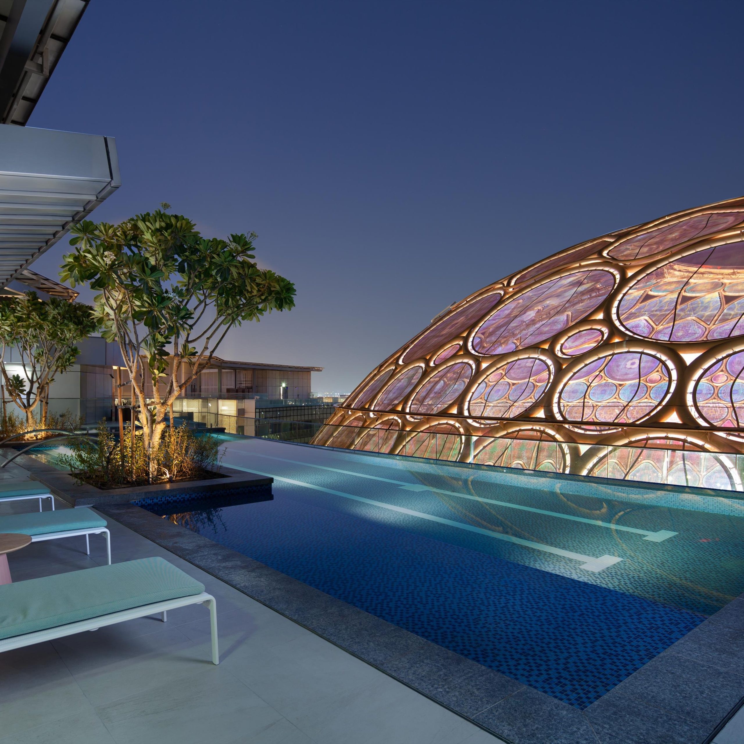 Rove Expo City pool overlooking the Al Wasl Dome at Expo City