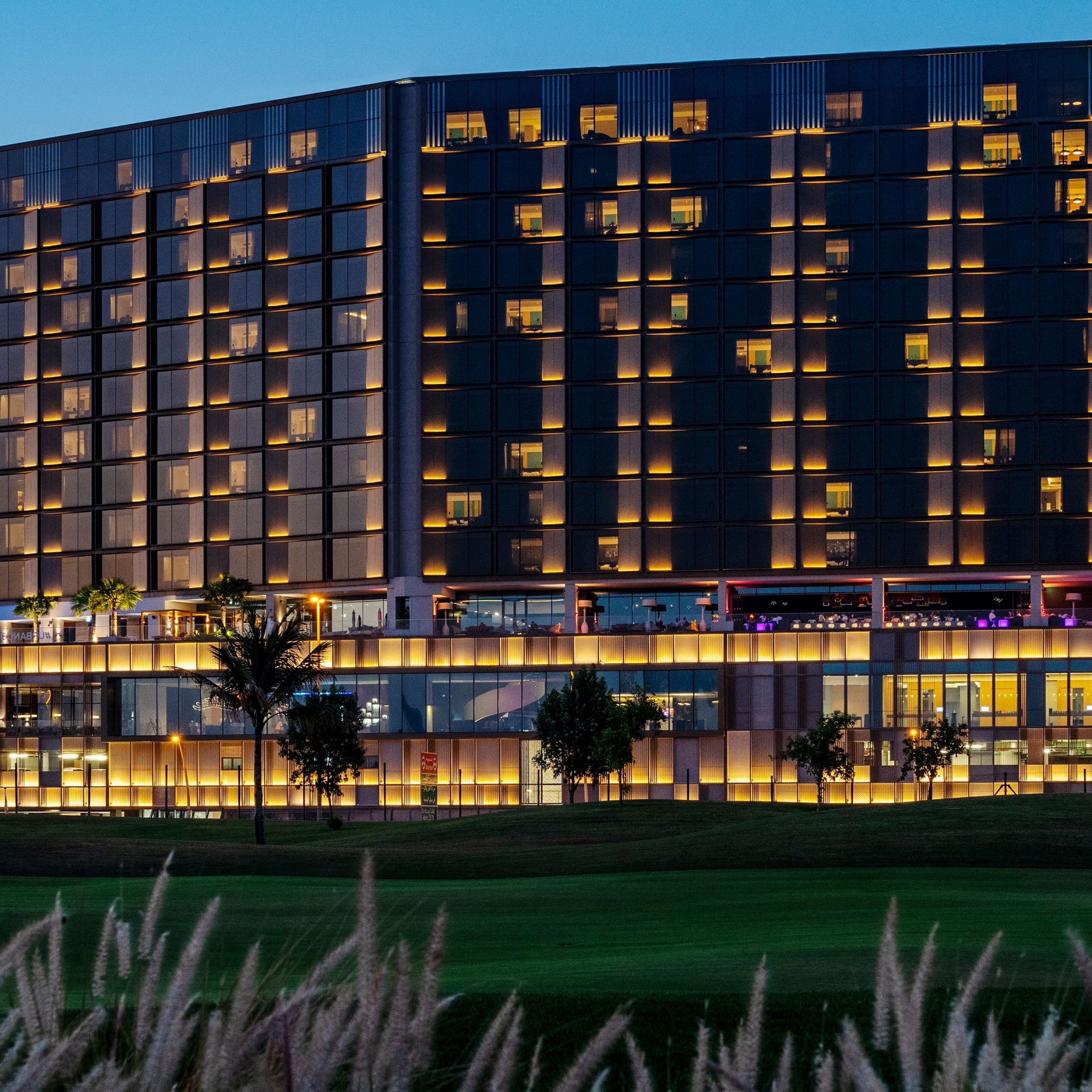 Aloft Dubai Creek colourful hotel lobby and exterior by the Creek