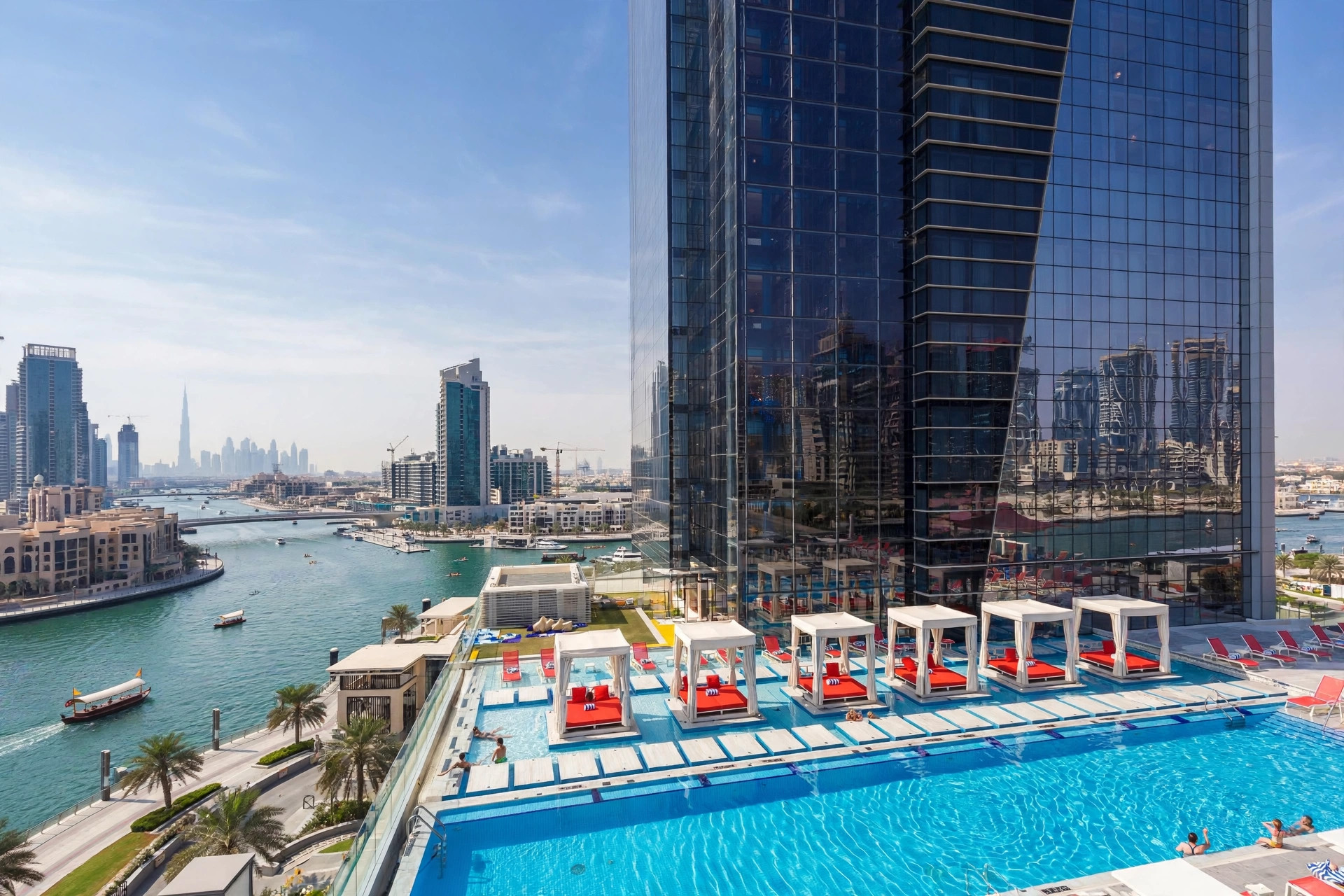 Outdoor pool and Burj Khalifa view at Canal Central Hotel Business Bay