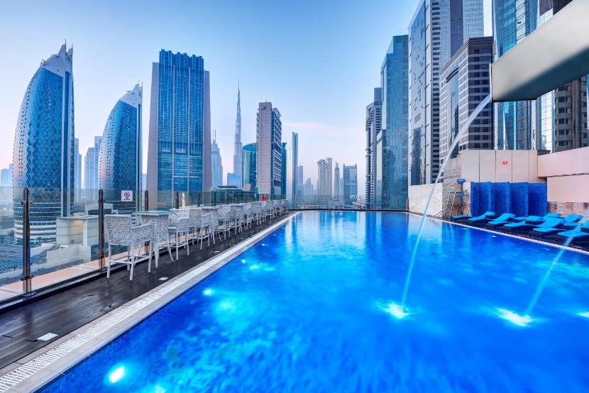 Gevora Hotel gold tower and high-floor pool on Sheikh Zayed Road