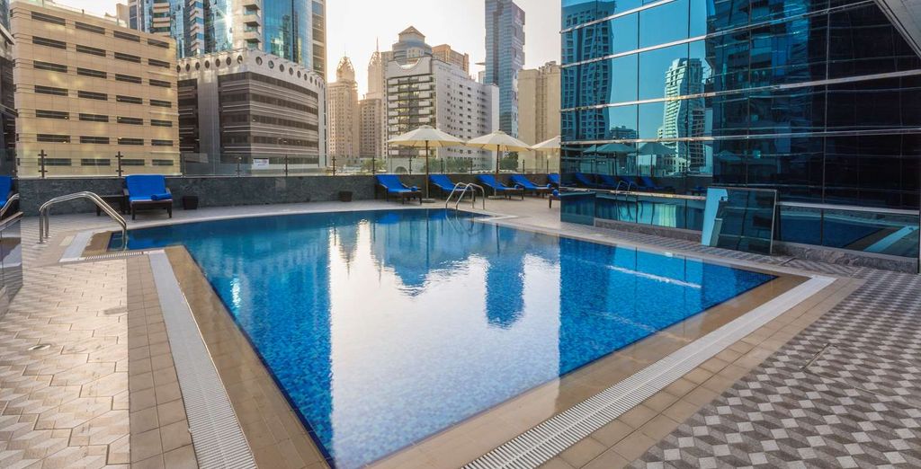 Golden Tulip Media Hotel pool and terrace in Barsha Heights Dubai