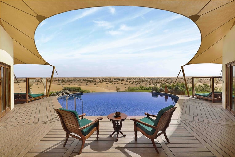 Al Maha desert resort private pool villa overlooking dunes and oryx