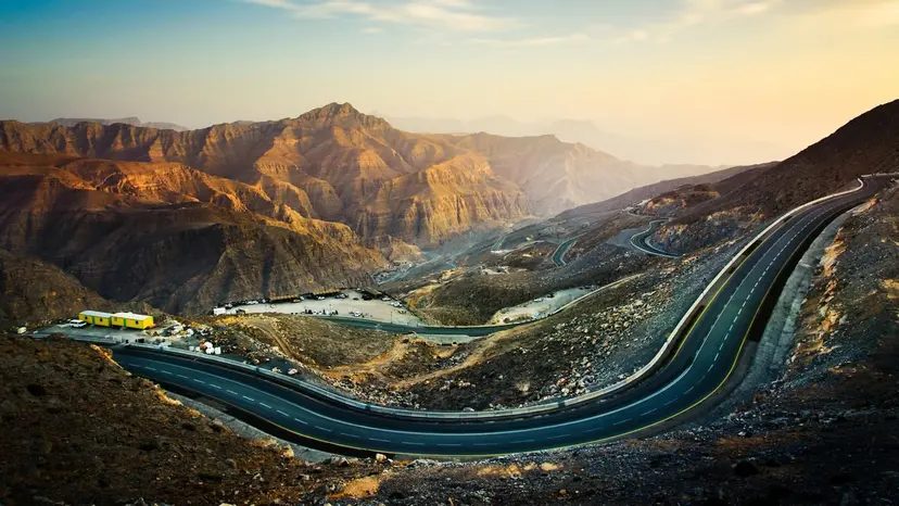 Khor Fakkan bay with mountains rising behind the beach and town