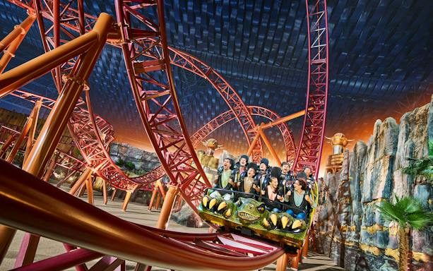 Visitors on a roller coaster at a Dubai theme park