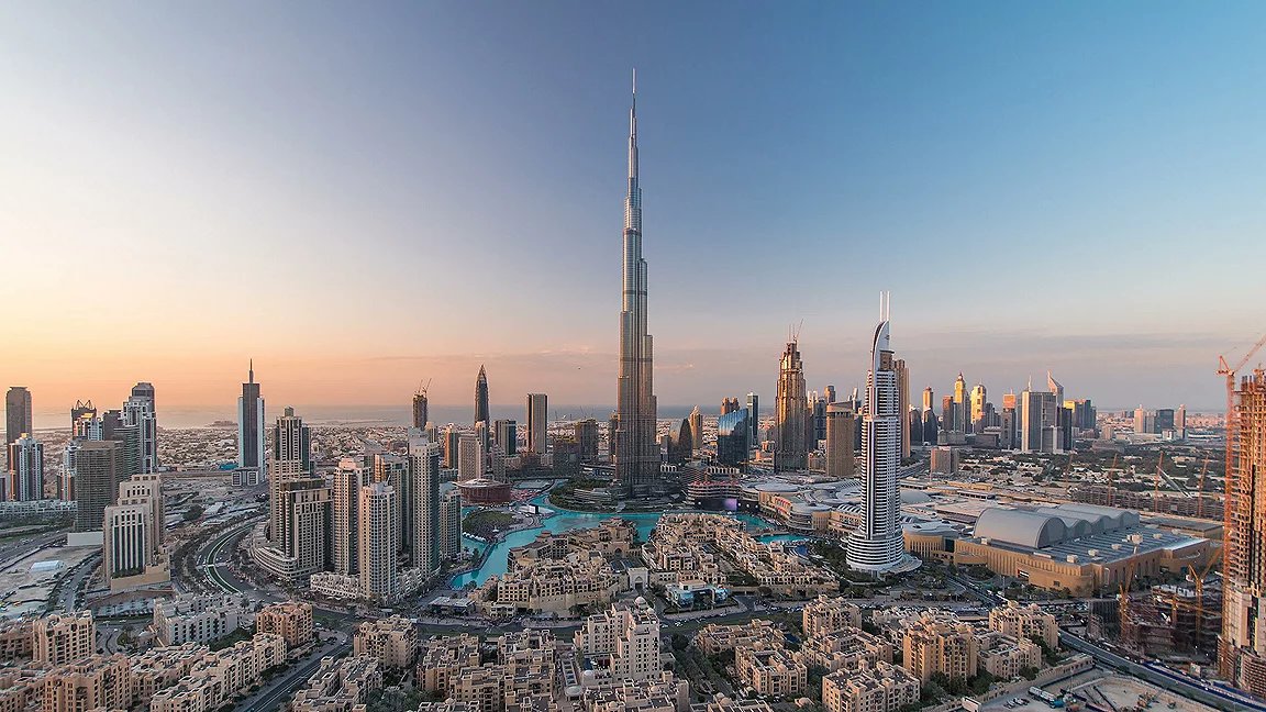Burj Khalifa and Downtown Dubai skyline in early morning light