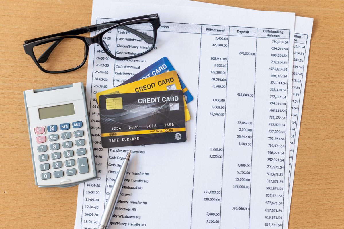 Bank statements and financial documents being reviewed for a visa application