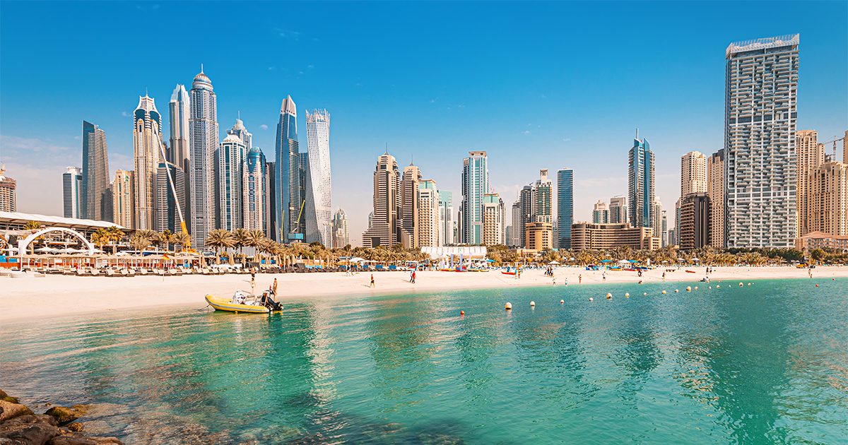 Dubai Marina skyline and the JBR beachfront at dusk