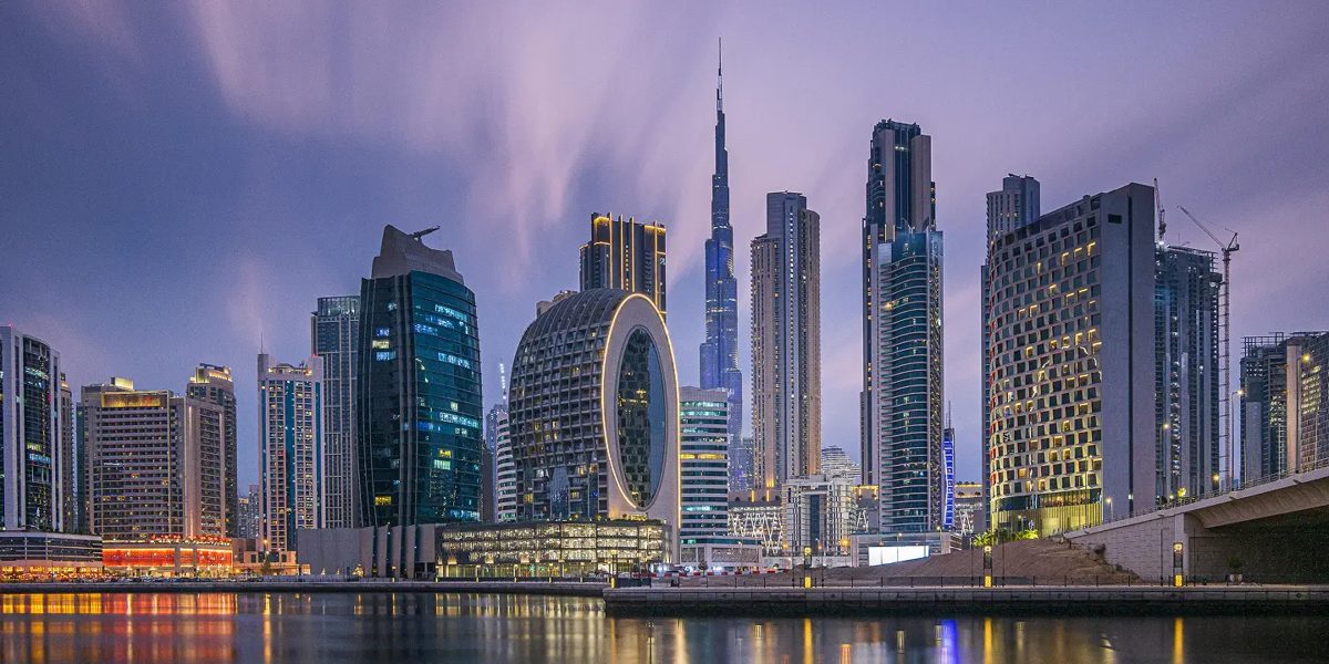 The Business Bay canal and skyline at night in Dubai