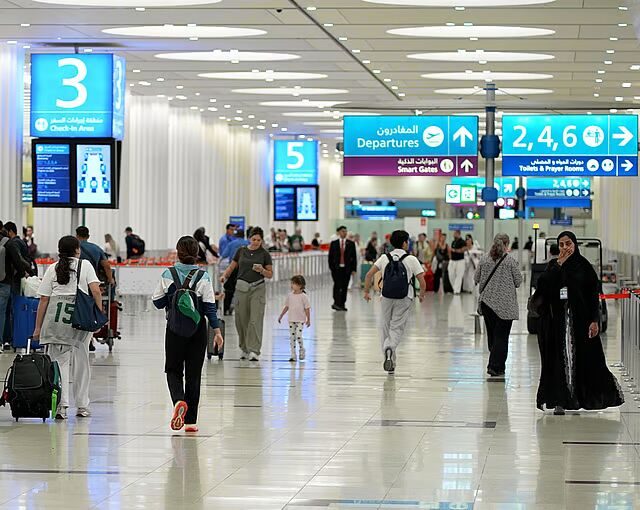 Dubai International Airport terminal — Dubai-issued visas are checked on the GDRFA portal