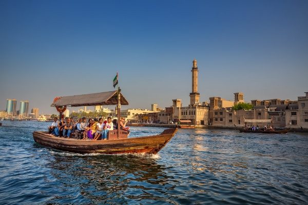 Traditional abra boats crossing Dubai Creek