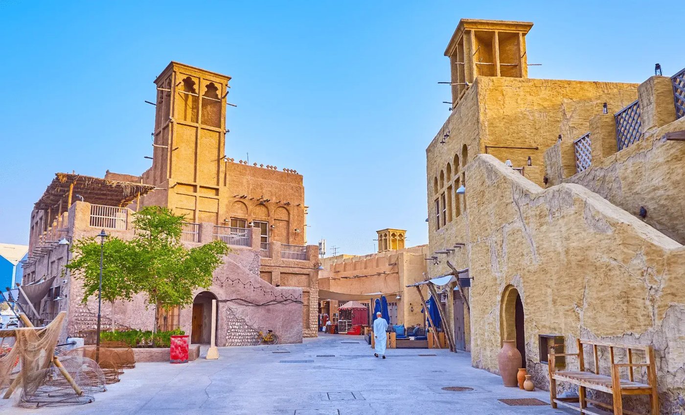 Wind tower houses and a narrow lane in Al Fahidi Historical Neighbourhood