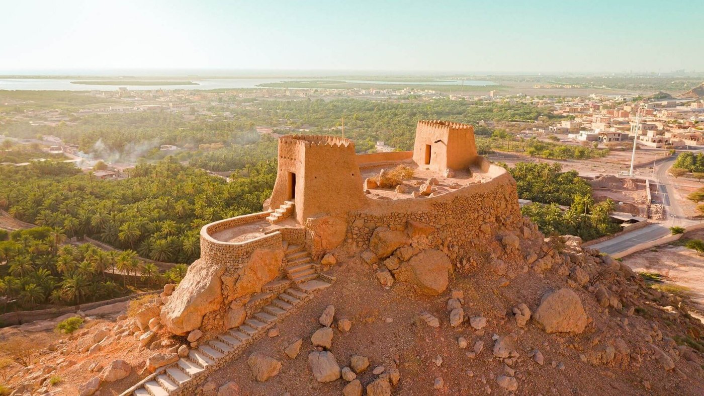 Hilltop Dhayah Fort above palm groves in Ras Al Khaimah