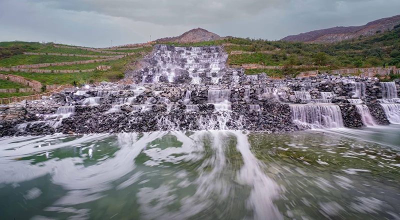 Terraced greenery and a waterfall at the Hanging Gardens in Kalba
