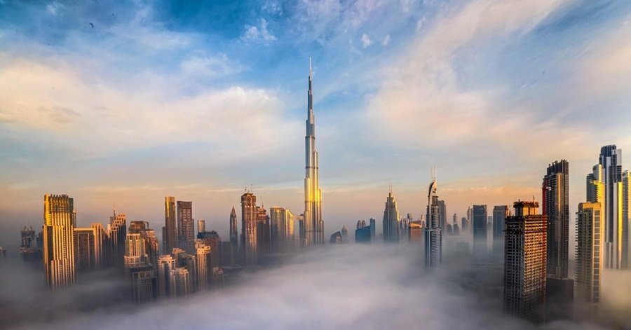 Burj Khalifa in morning light against a clear sky