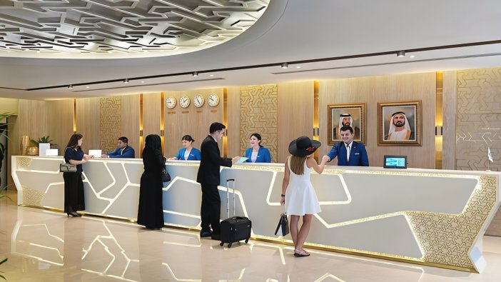Hotel reception desk in Dubai where a guest is checking in