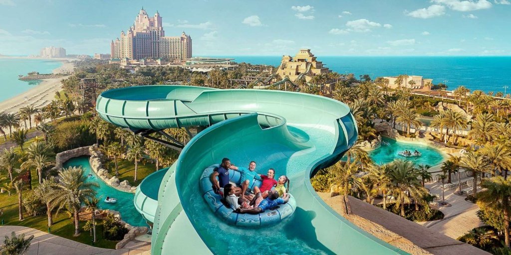 Short queue at a water slide on a quiet weekday morning