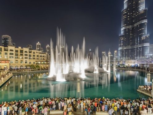 Crowds watching the Dubai Fountain show at night