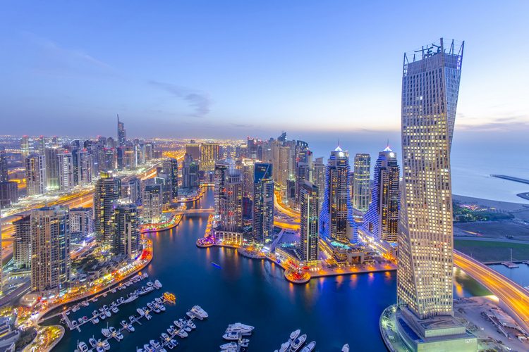 Dubai Marina skyline lit up in the evening