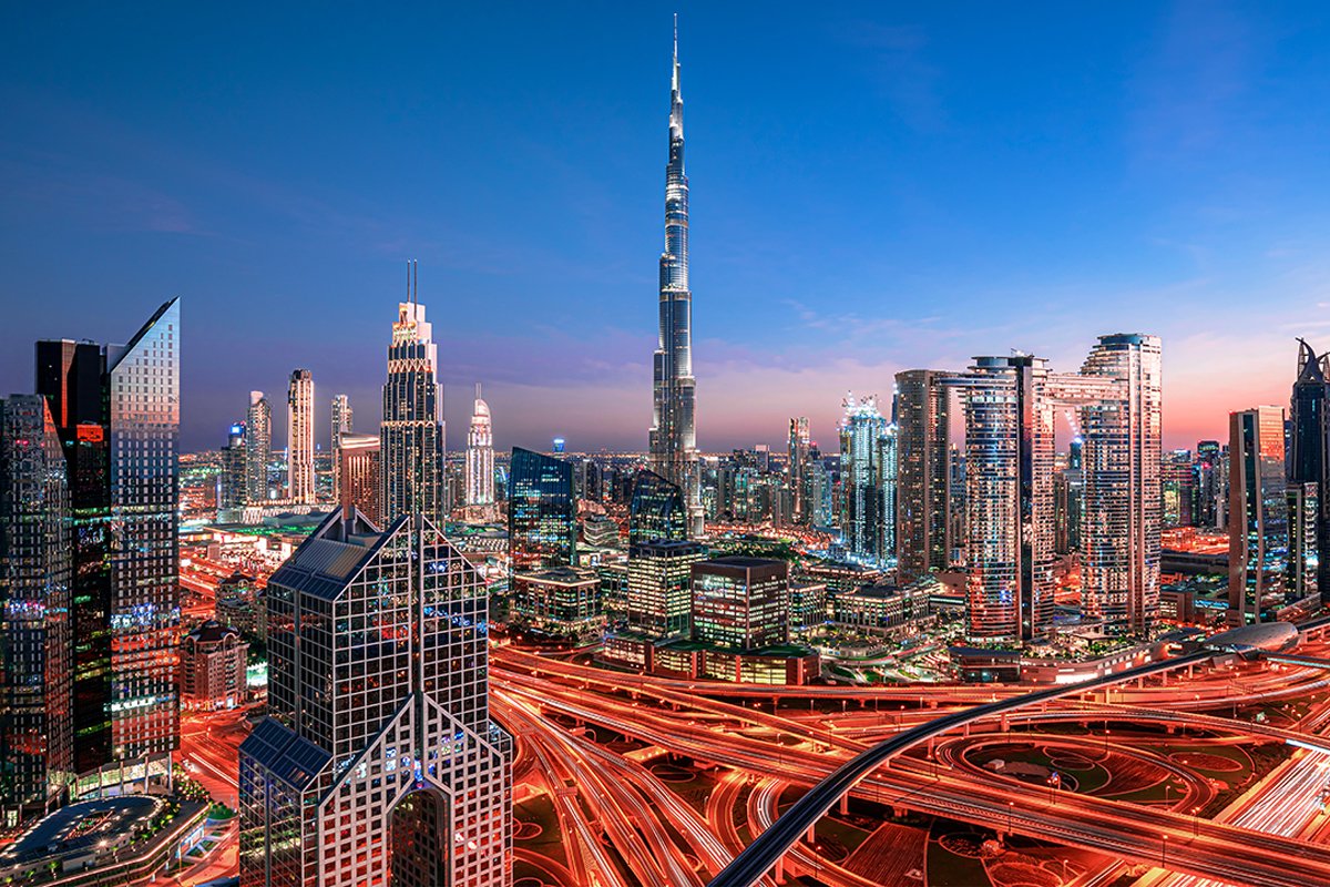 A traveller looking over the Dubai skyline after arriving