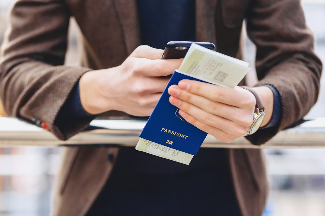 Traveller checking documents before departure